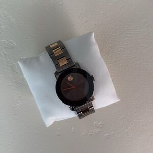 Black and Gold Movado Bold